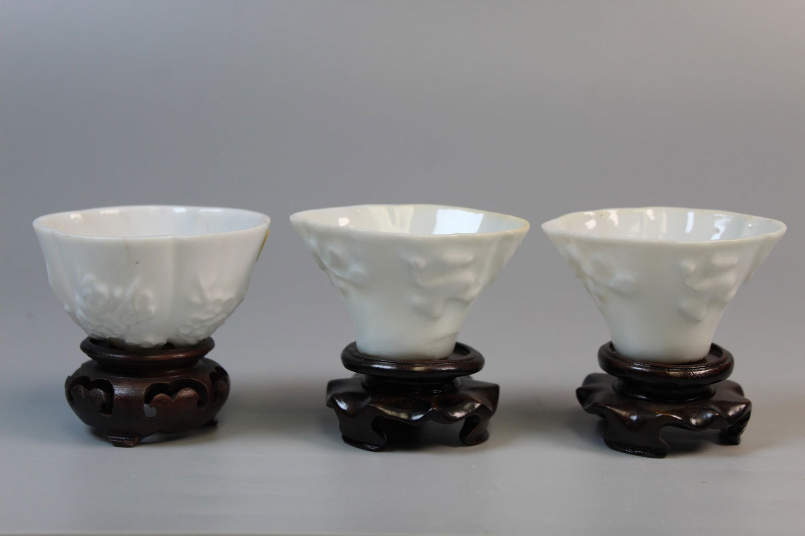 Three Chinese Blanc de Chine Porcelain Cups on Wood Stands. (1 of 9)