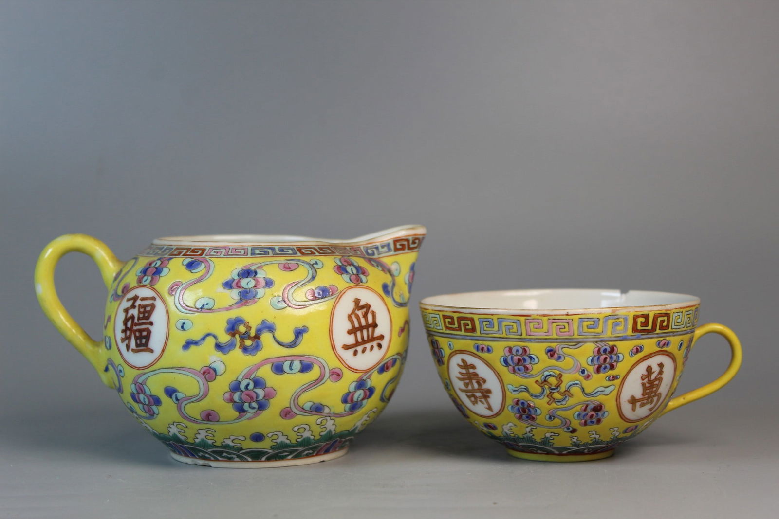 Chinese Famille Rose Porcelain Creamer and Cup: Chinese Famille Rose Porcelain Creamer and Cup. L 5.5". H 3.25". As Is.