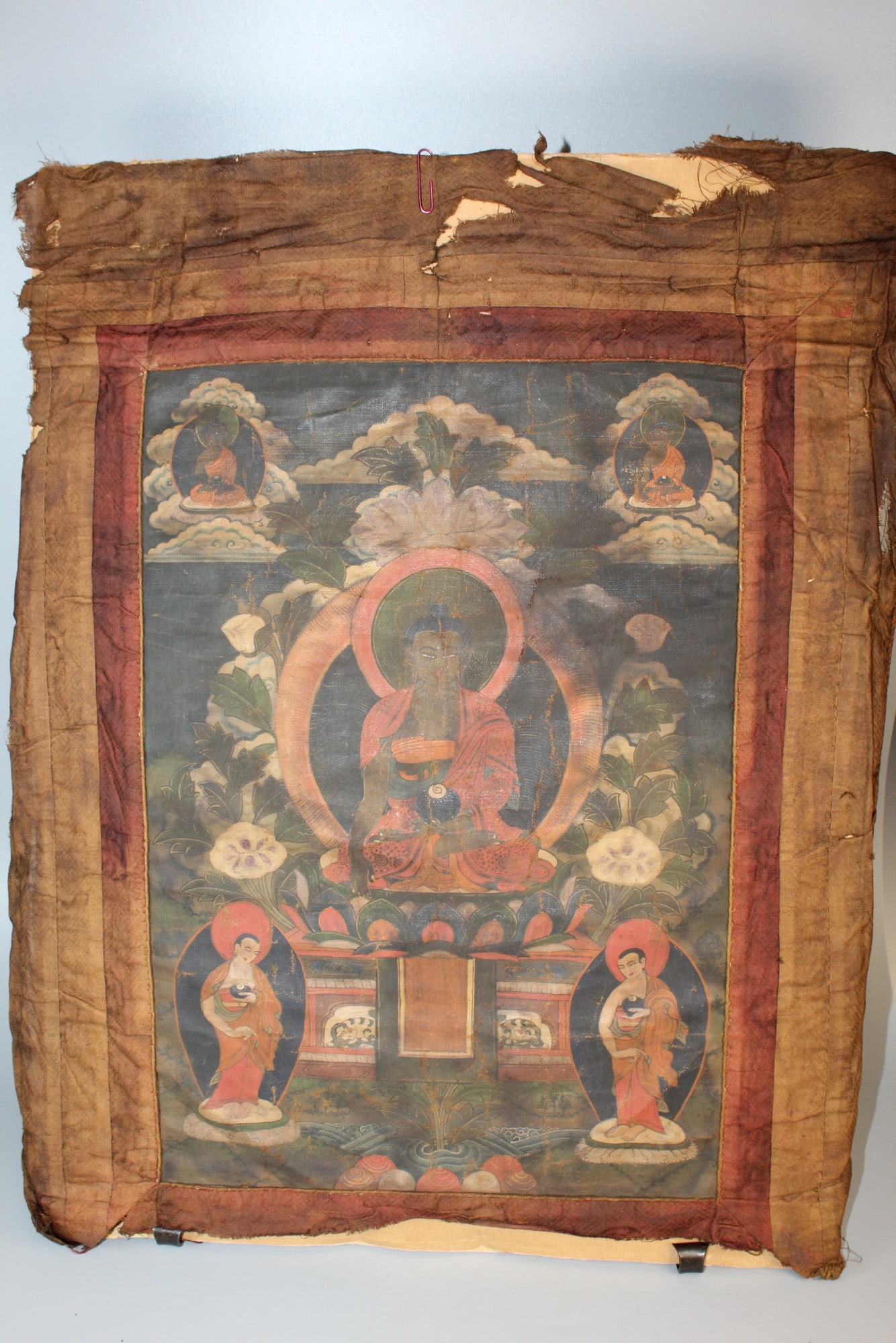 Tibetan Thangka, 19th C.: Tibetan Thangka, 19th C.. Painting size 18 x 12.5". Total size 24 x 19". As Is.