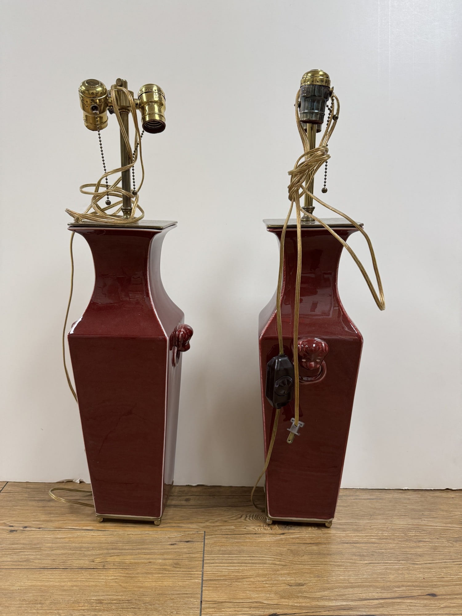 Pair of Chinese red porcelain lamps: Pair of Chinese red porcelain lamps. about 27" H