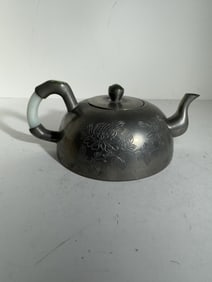 Chinese metal teapot with jade handle