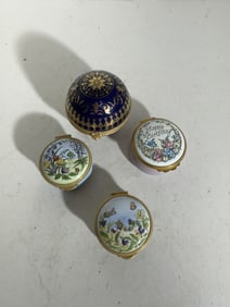 Three Staffordshire and one Estee Lauder trinket boxes