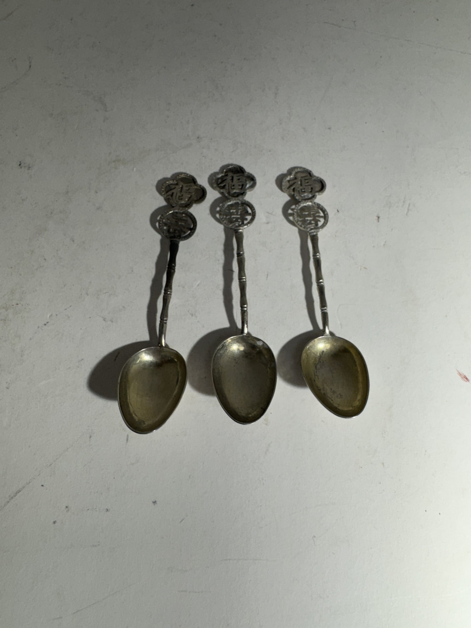 Three Asian sterling silver spoons (1 of 3)