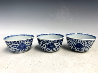 Three Chinese blue and white porcelain wine cups.