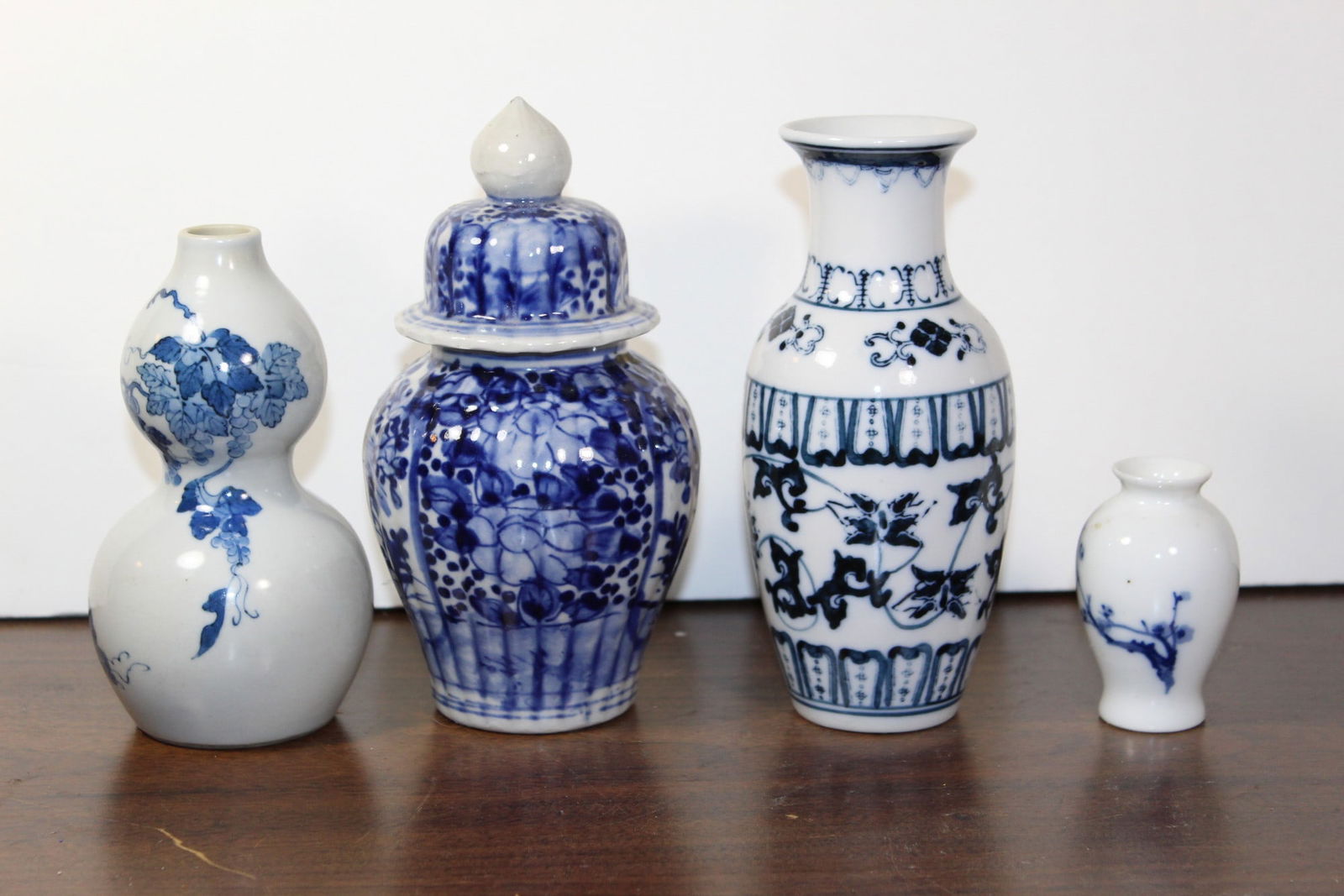 Four Chinese Blue and White Porcelain Vases: Four Chinese Blue and White Porcelain Vases. H 6"