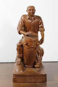 Asian carved wood figure, signed