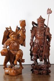 Two Chinese carved wood statues of guardians