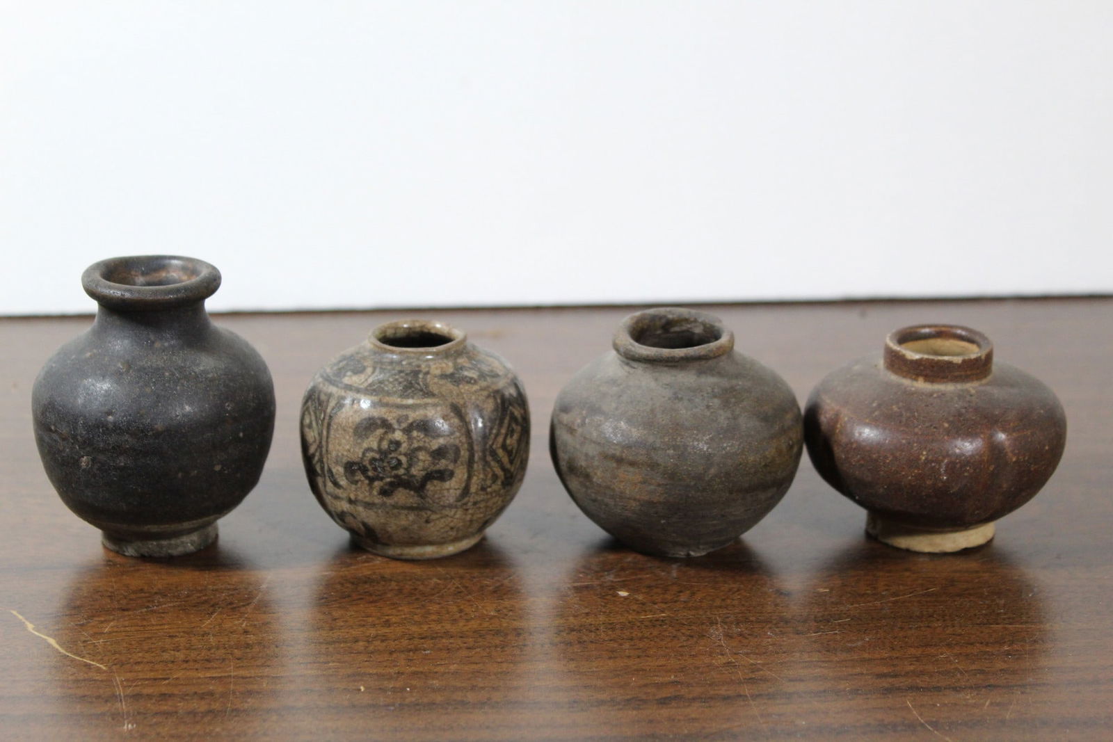 Four Antique pottery jarlet, 12th - 13th Century: Four Antique pottery jarlet, 12th - 13th Century. H 3". Diam 2.75"