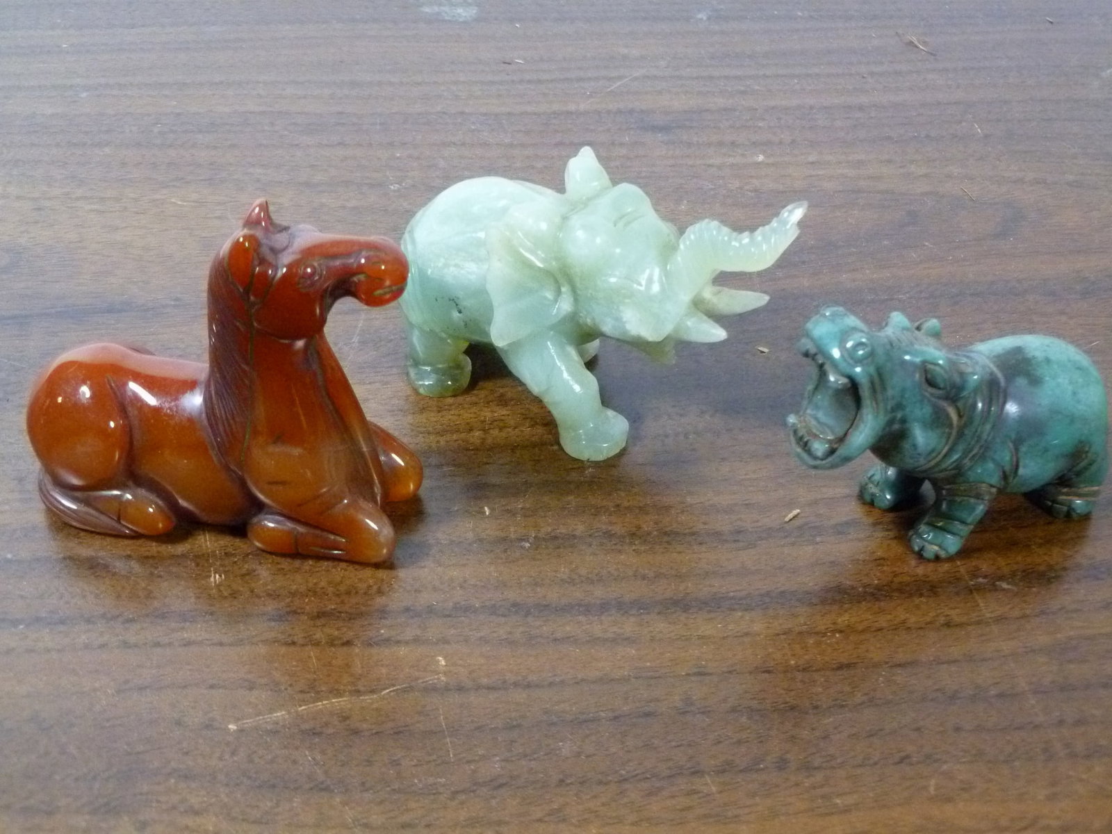 Three Chinese carved stone animal figurines (1 of 4)