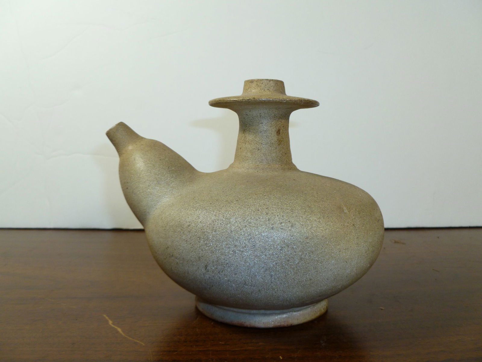 Asian pottery Kendi: Asian pottery Kendi. H 5.25". L 6"