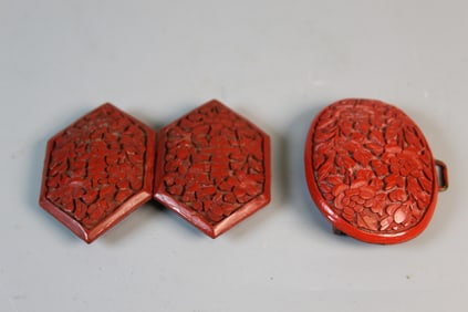 Two Chinese Cinnabar Belt Buckles