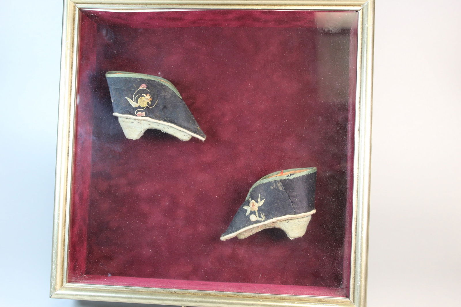 Framed Pair of Chinese Antique Lady's Embroidered Shoes: Framed Pair of Chinese Antique Lady's Embroidered Shoes. Frame 12.5x12.5x3".