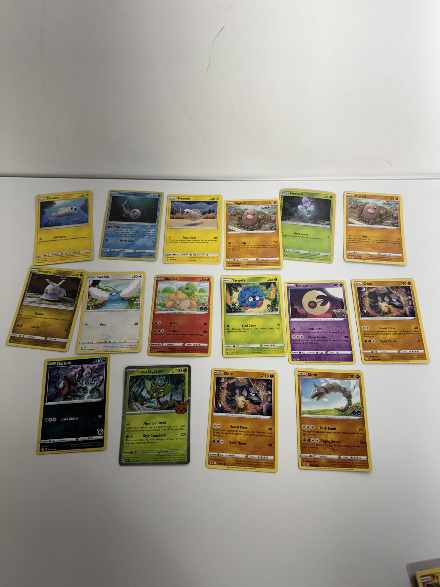 Lot of 16 pre owned Basic Pokemon cards (1 of 2)
