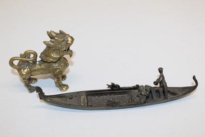 A Metal Boat and a Foo Lion