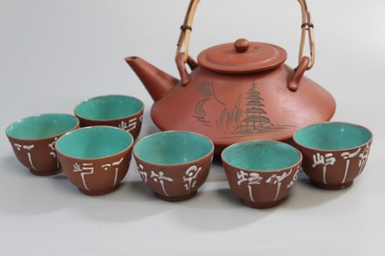 Asian Pottery Teapot and Six Teacups.