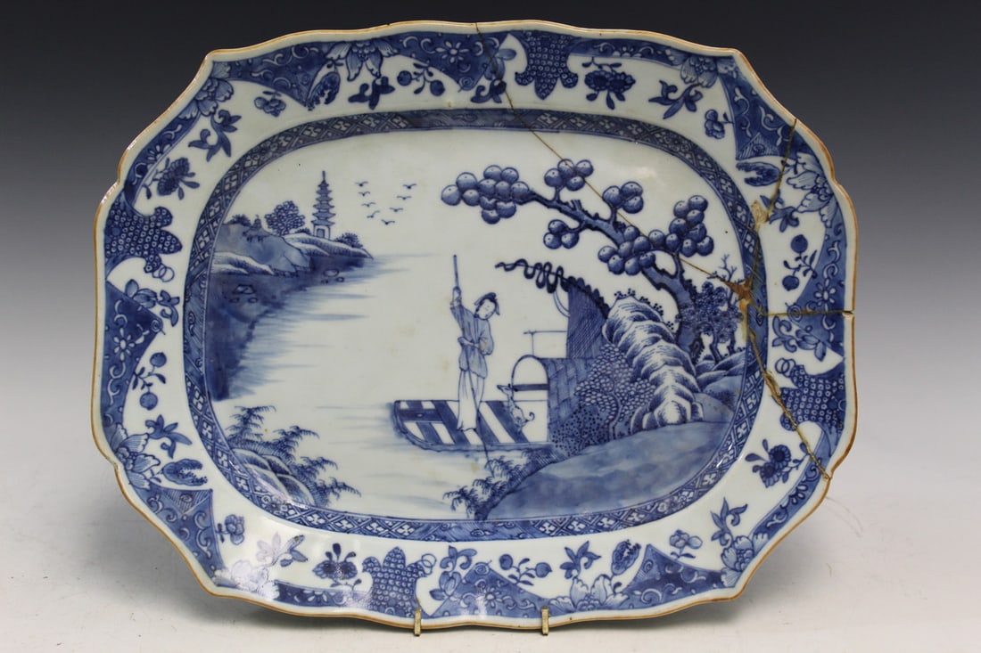 Chinese export blue and white porcelain plate, 18th C.: Chinese export blue and white porcelain plate, 18th C. Size 15" x 12". AS IS. Staple and glue repair.