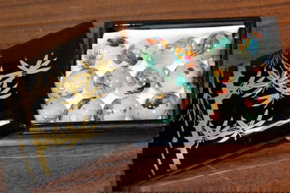 A Group of Chinese Reverse Painted Glass Beads in a Lacquer Box