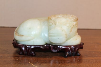 Chinese Carved Celadon Jade Bull on Wood Stand