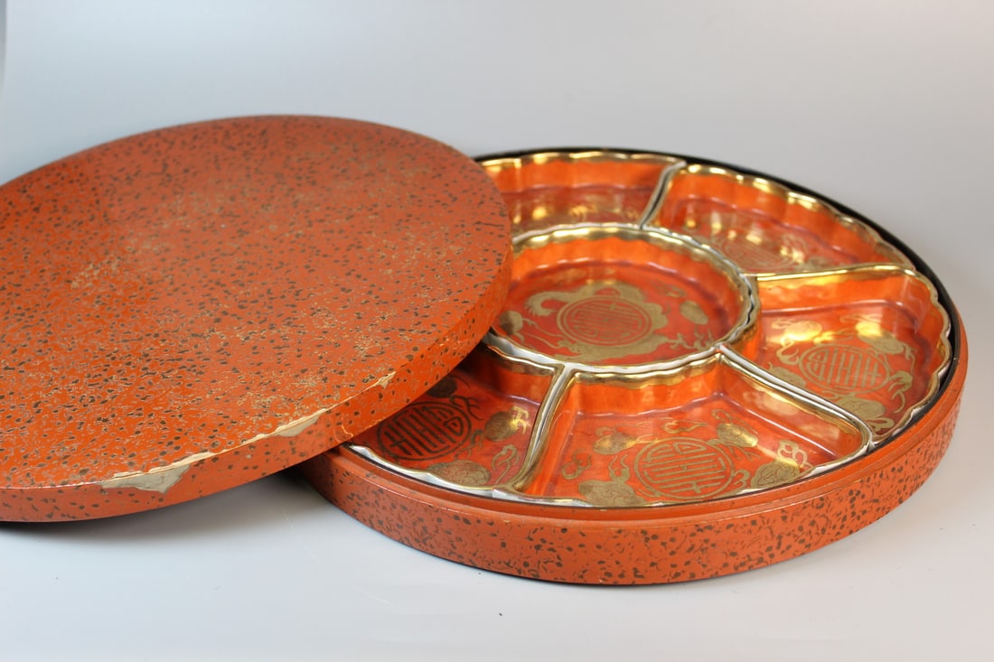 Japanese Coral Red Glaze Porcelain Fruit Dish Set with Gilt Dragon Decorations in a Lacquered Box.: Japanese Coral Red Glaze Porcelain Fruit Dish Set with Gilt Dragon Decorations in a Lacquered Box.. Box Diam 12.5". H 2".