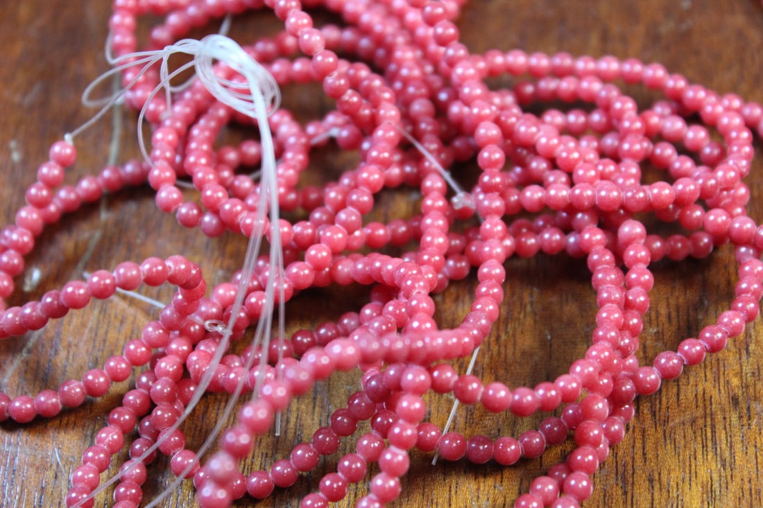 Ruby Color Stone Beads: Ruby Color Stone Beads. Diam 0.2".