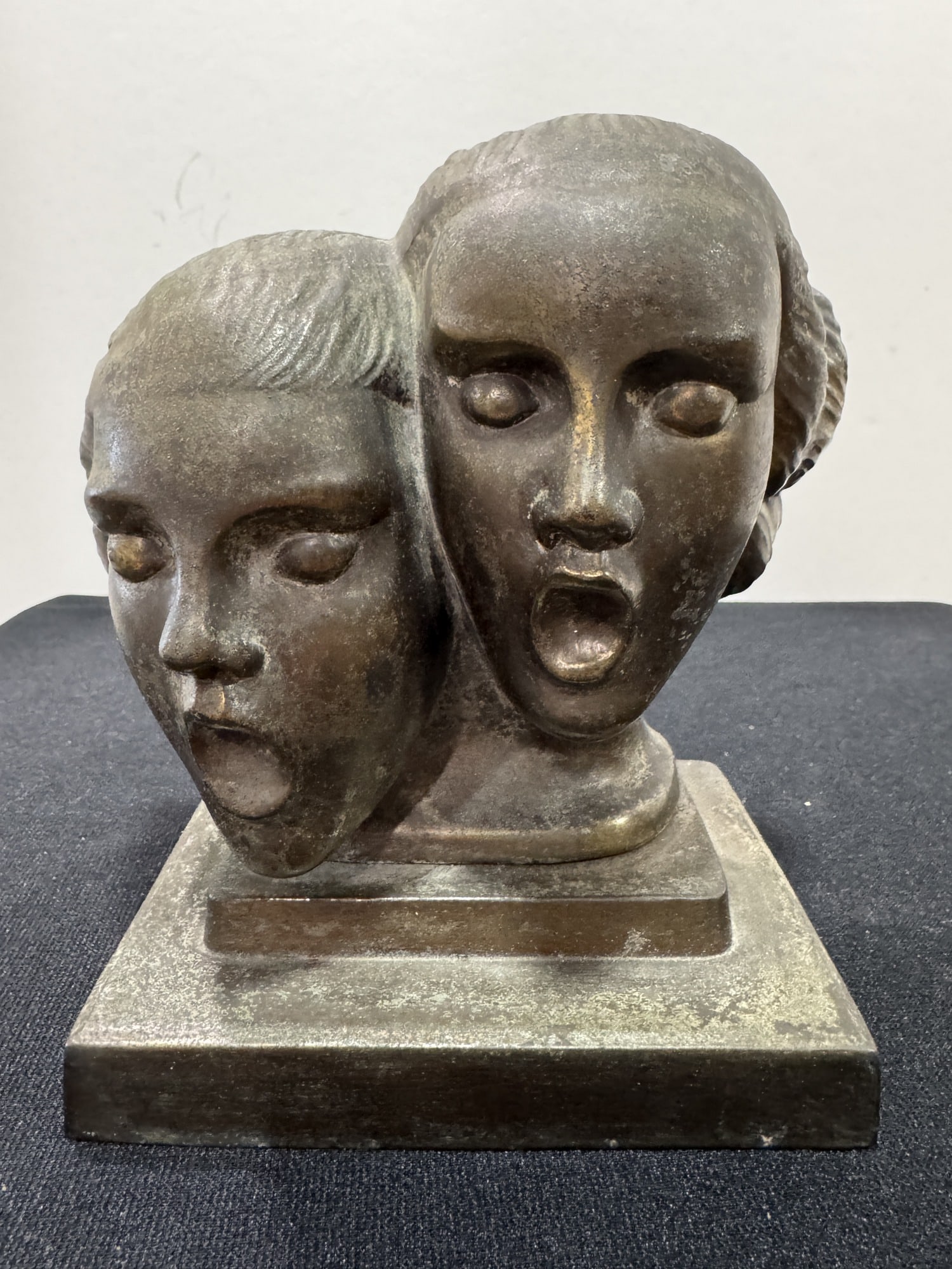 Bronze sculpture of two heads (1 of 4)