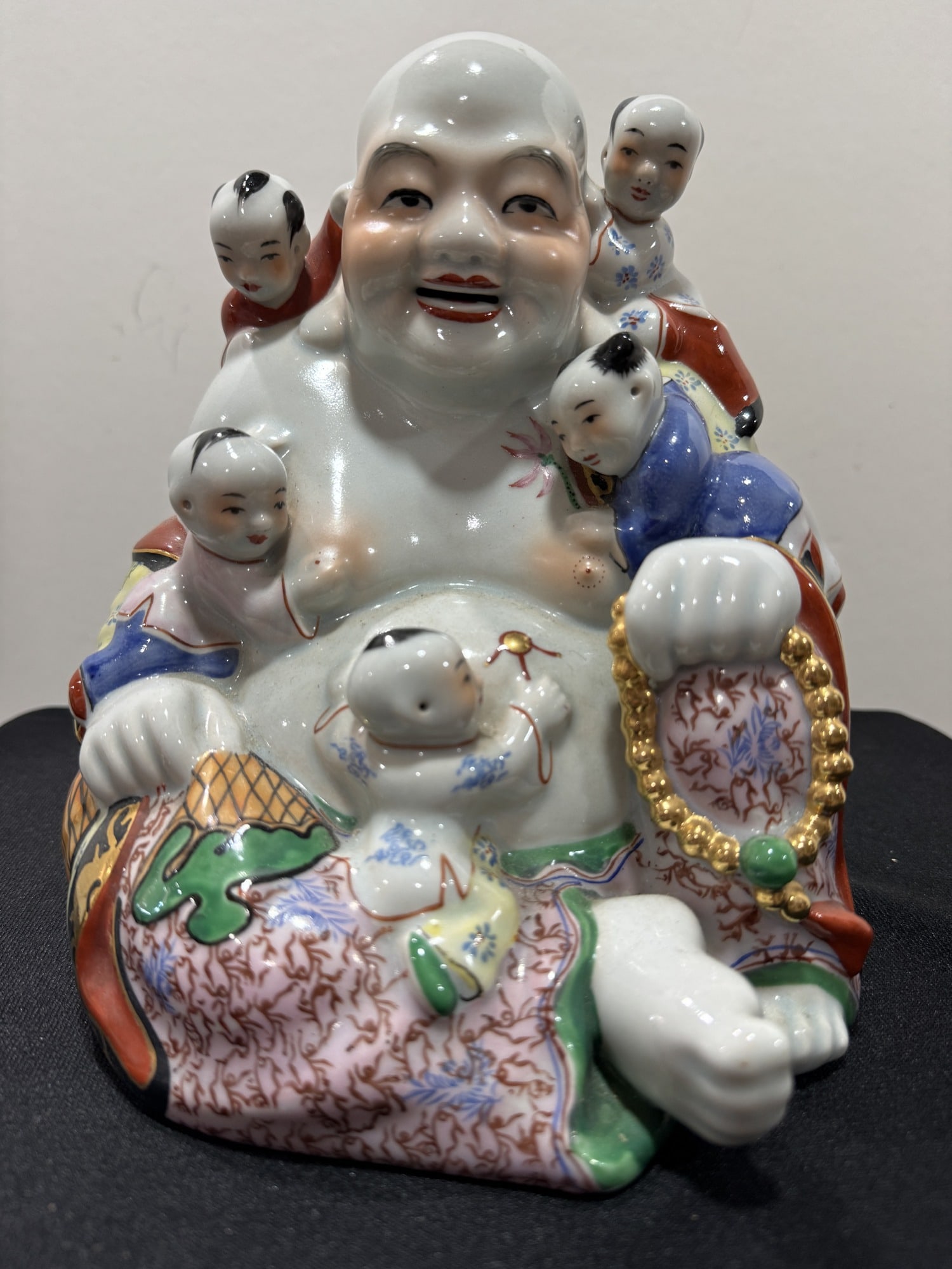 Porcelain Happy Buddha with children: Porcelain Happy Buddha with children. 9" H x 8" W