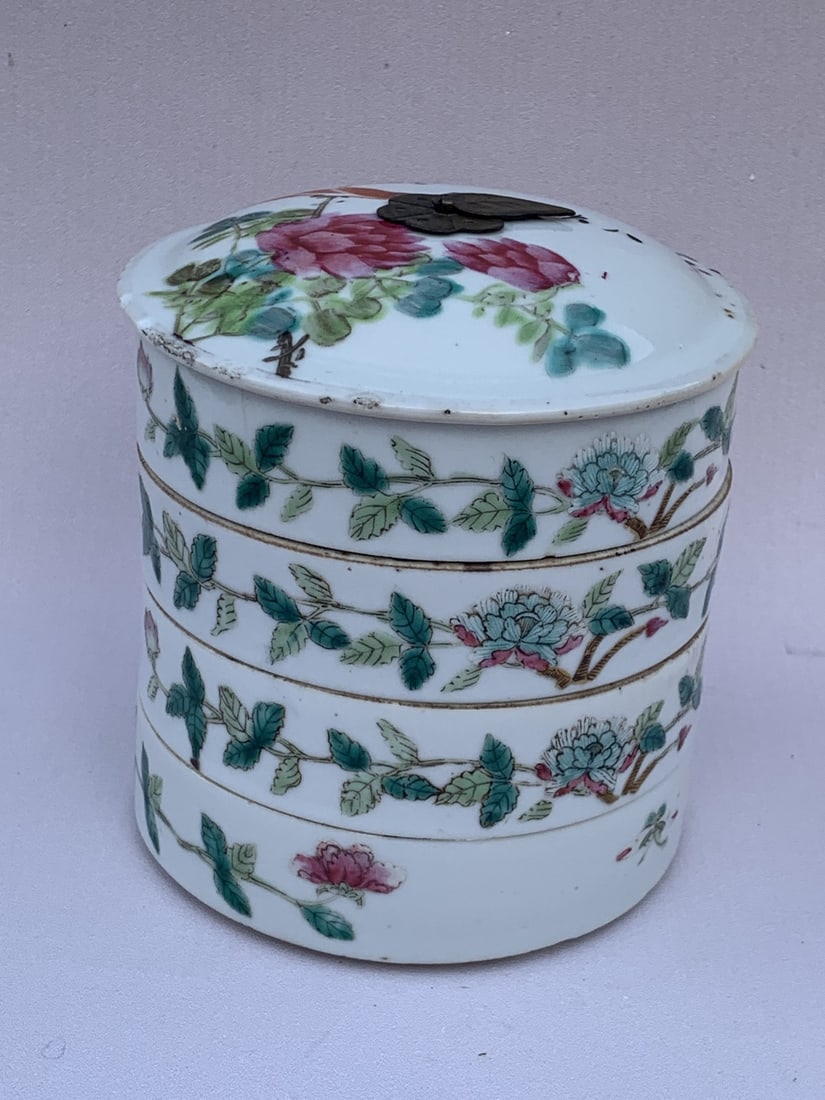 Chinese famille rose porcelain four tier stacking dishes: Chinese famille rose porcelain four tier stacking dishes. H 5.5". Diam 4.25".