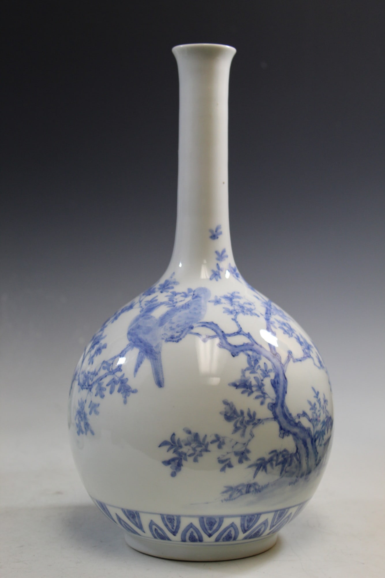 Japanese Blue and White Porcelain Vase: Japanese Blue and White Porcelain Vase. H 13". As Is.