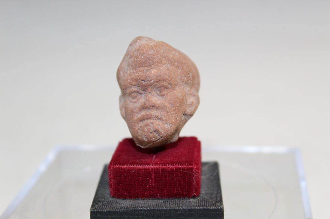 Greco-Roman Head of a Satyr: Greco-Roman Head of a Satyr. 2nd-1st century BCE. Terracotta. Total H 2 1/4".