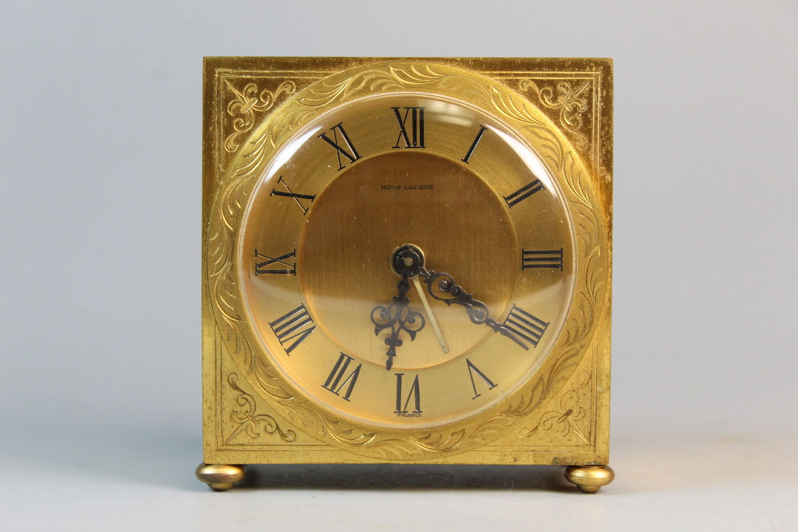Hour Lavigne Made in France Clock: Hour Lavigne Made in France Clock. 3.25x3x1.5".