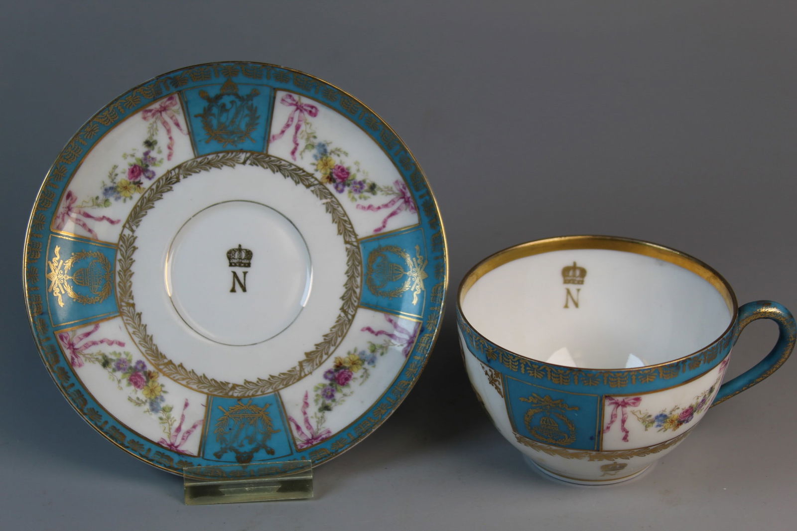 European Porcelain Cup and Saucer: European Porcelain Cup and Saucer. Saucer Diam 5.5". AS IS.