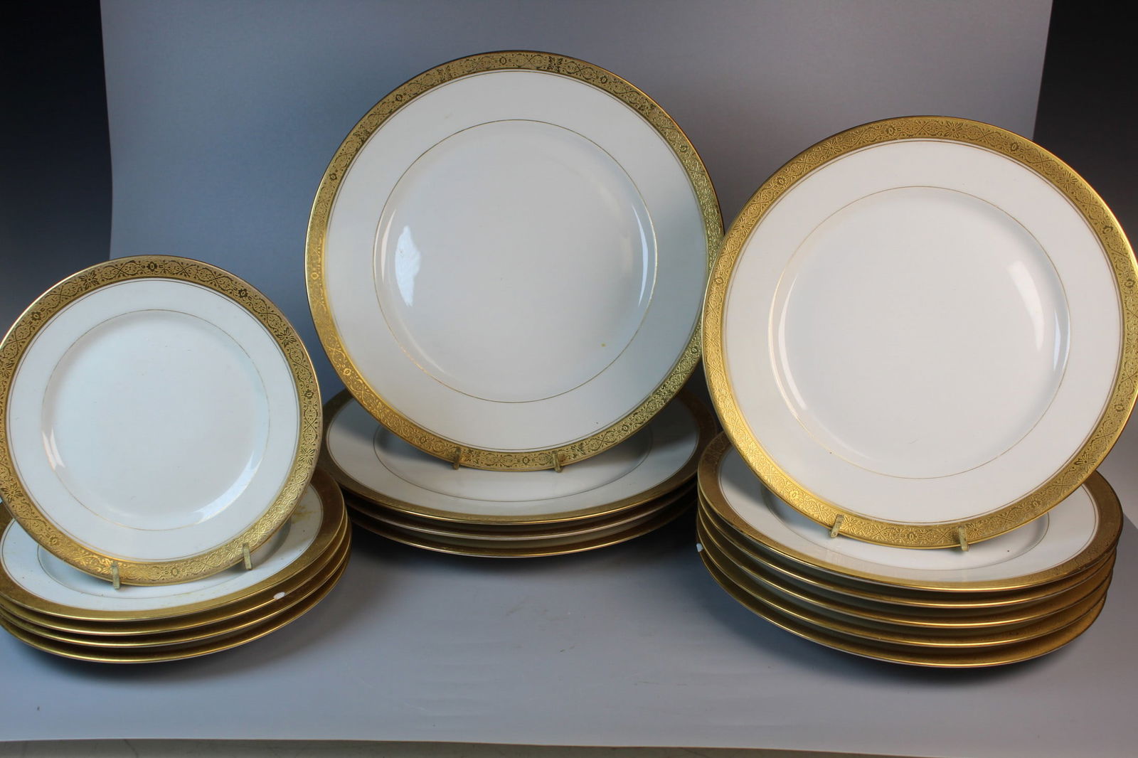 C Ahrenfeldt Limoges France Depose Gold Rimmed Dishes: C Ahrenfeldt Limoges France Depose Gold Rimmed Dishes. Largest Diam 9.75".