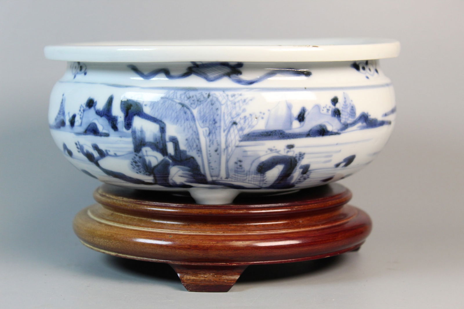 Chinese Blue and White Porcelain Incense Burner on Wood Stand: Chinese Blue and White Porcelain Incense Burner on Wood Stand. Diam 8.25". H 3.5". Stand H 2".