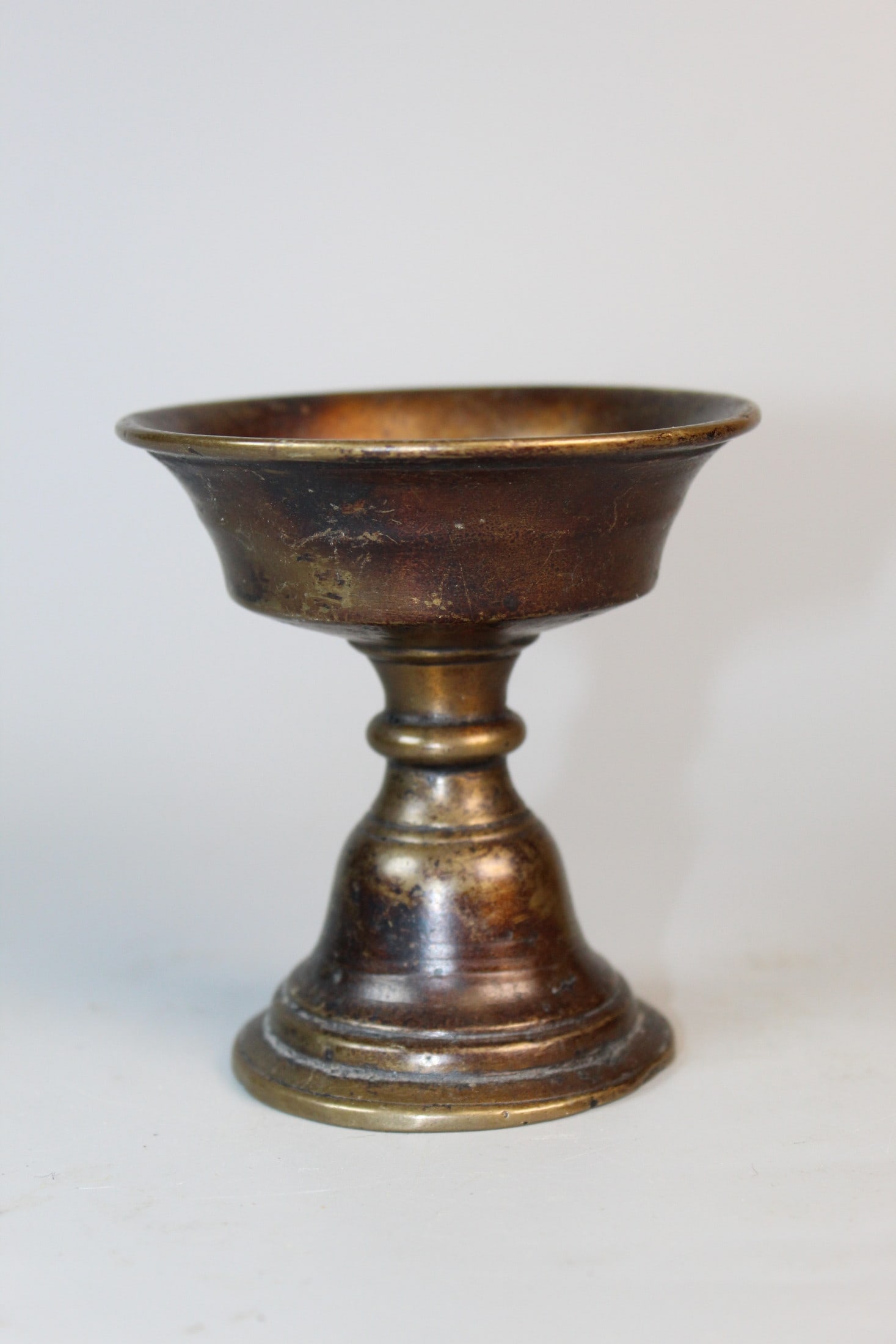 Tibetan Brass Bell: Tibetan Brass Bell. H 3.5". Diam 3.5".