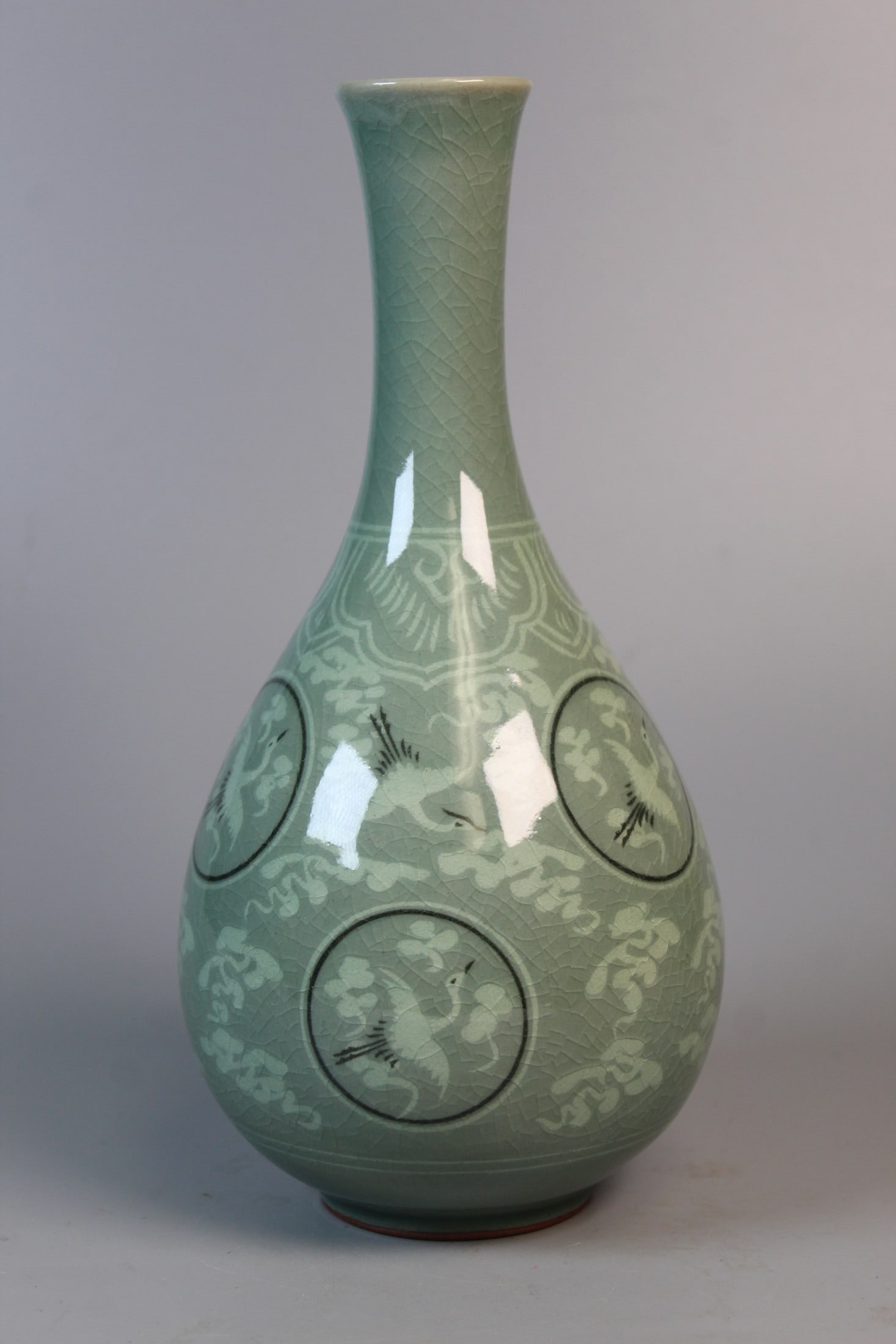 Korean Celadon Porcelain Vase: Korean Celadon Porcelain Vase. H 9". Diam 4.25".