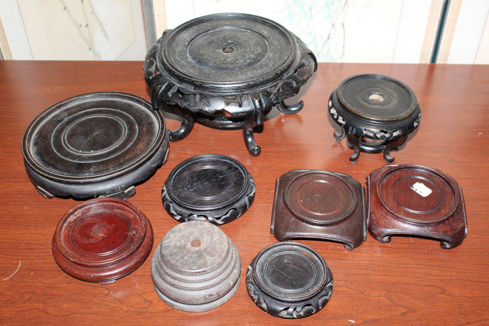 A Group of Asian Round Shaped Wood Stands: A Group of Asian Round Shaped Wood Stands. Largest Inner Rim diam 6.5".