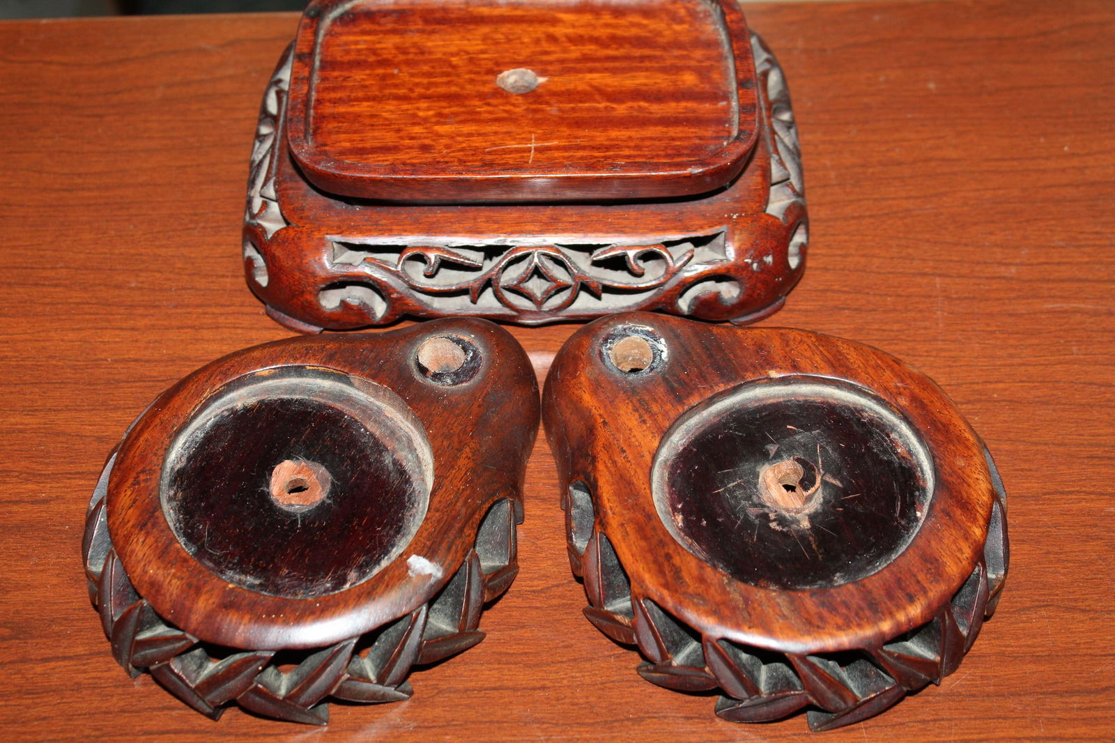 Three Carved Asian Wood Stands: Three Carved Asian Wood Stands. Largest Inner Rim 5x3.25".