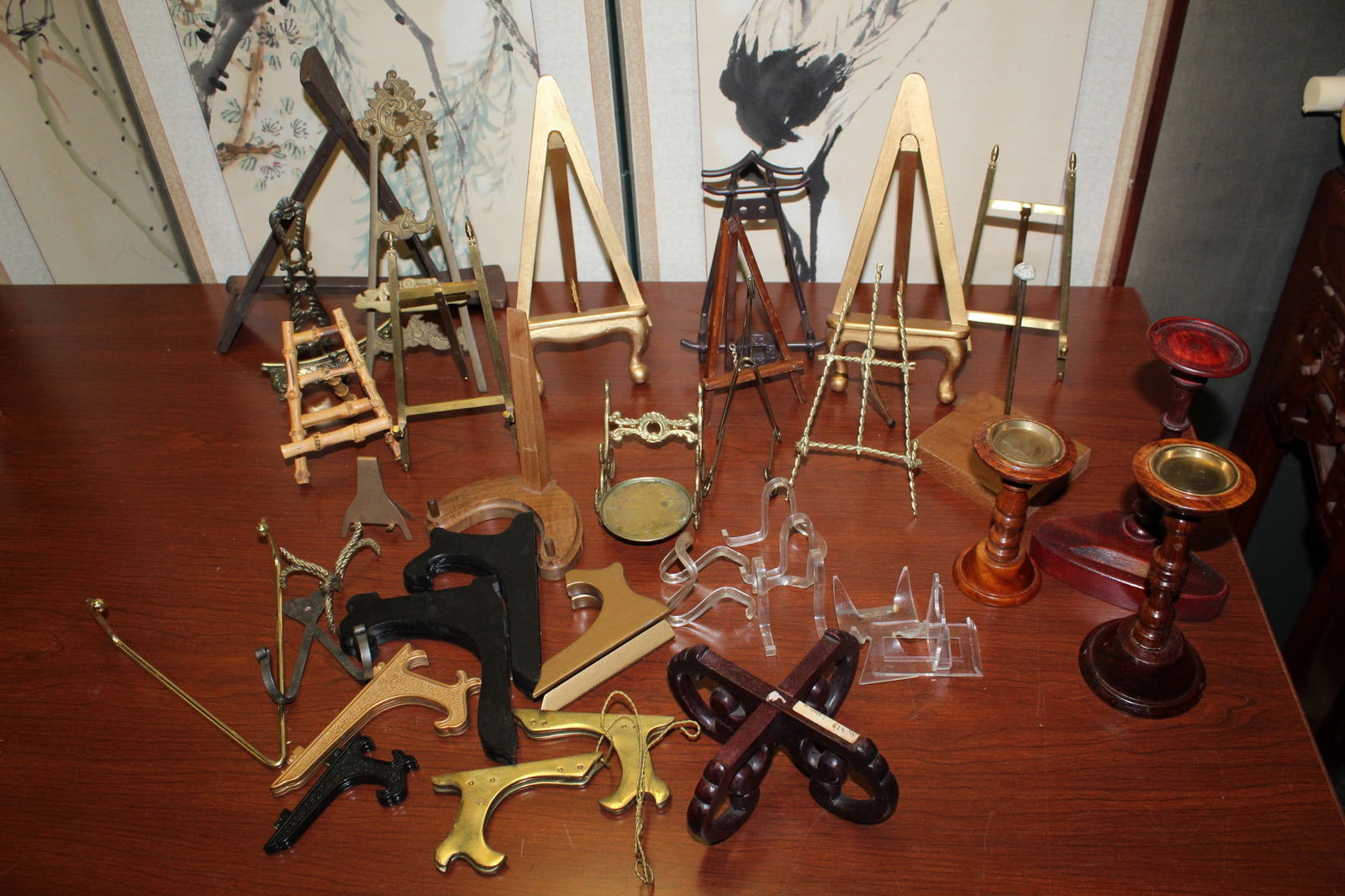 A Group of Wood and Metal Plate Stands: A Group of Wood and Metal Plate Stands. Largest H 9.5".