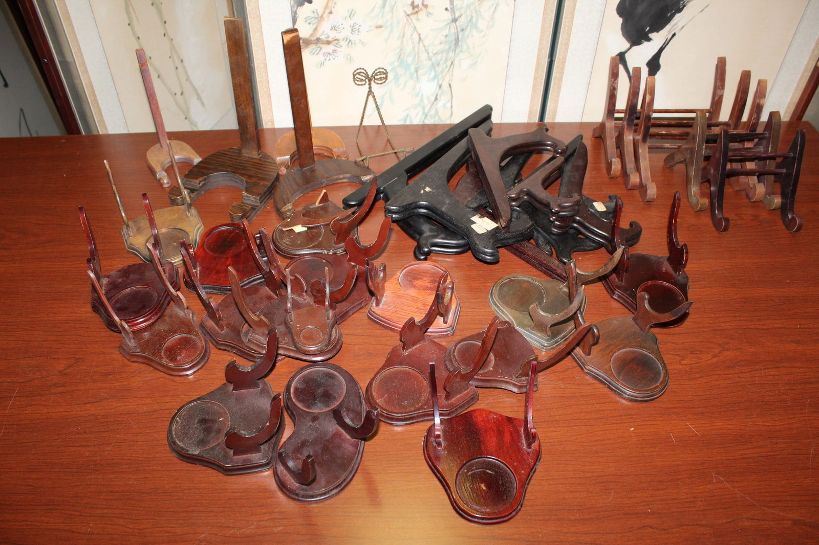 A Large Group of Wood Plate Holders/stands.: A Large Group of Wood Plate Holders/stands.. Tallest H 13".