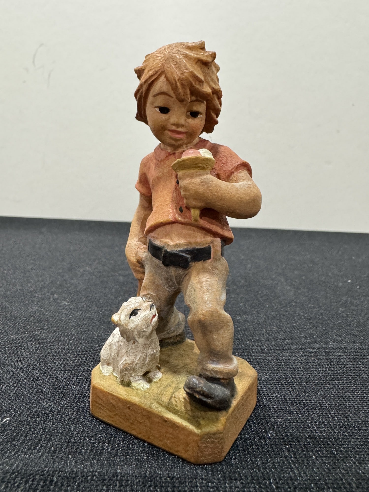 Anri hand carved and painted wood sculpture boy with ice cream: Anri hand carved and painted wood sculpture boy with ice cream. Height 4"