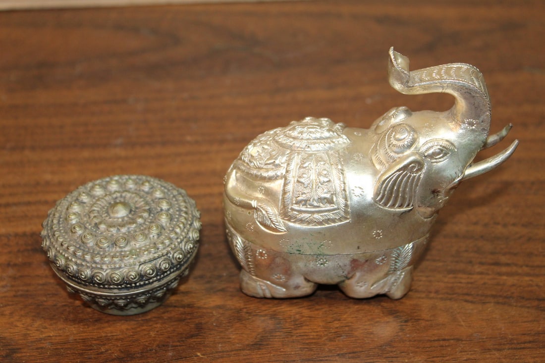 Two Asian Silver Tone Boxes: Two Asian Silver Tone Boxes. Elephant L 4". Box Diam 2".