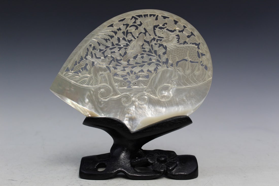 Chinese Carved Abalone Shell on Wood Stand: Chinese Carved Abalone Shell on Wood Stand. L 8".