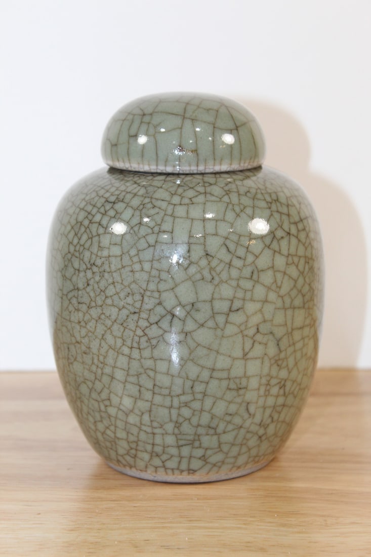 Chinese Celadon Crackle Glaze Porcelain Jar: Chinese Celadon Crackle Glaze Porcelain Jar. H 6". Diam 4.5". 19th Century.