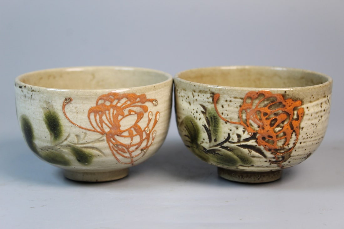 Pair of Japanese Pottery Tea Cups.: Pair of Japanese Pottery Tea Cups.. Diam 3.5", H 2.25".