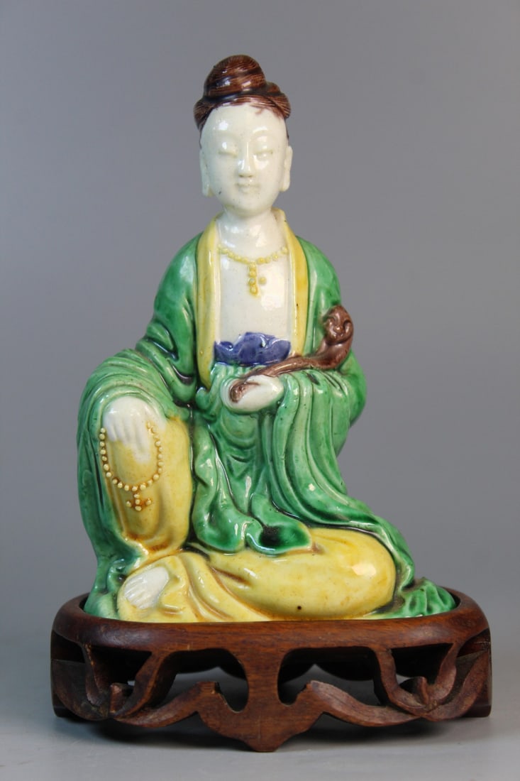 Chinese Sancai Glazed Porcelain Guanyin Statue on Wood Stand: Chinese Sancai Glazed Porcelain Guanyin Statue on Wood Stand. H 5.25" without stand.