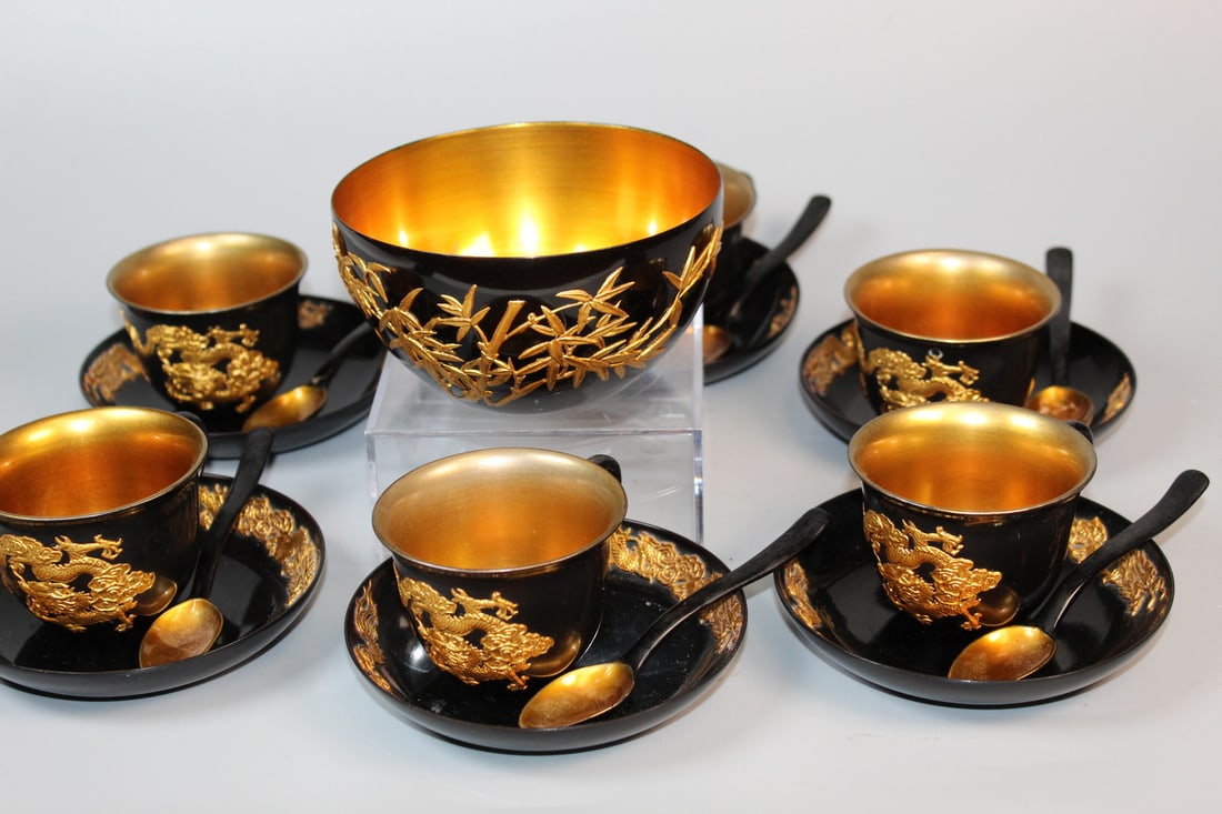 Chinese Gilt Decorated Lacquer Tea Set: Chinese Gilt Decorated Lacquer Tea Set. Bowl diam 4.75". Cup H 2".