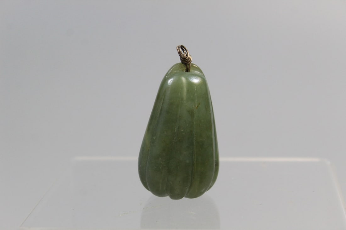Chinese Carved Green Jade Melon Pendant: Chinese Carved Green Jade Melon Pendant. H 1.5".