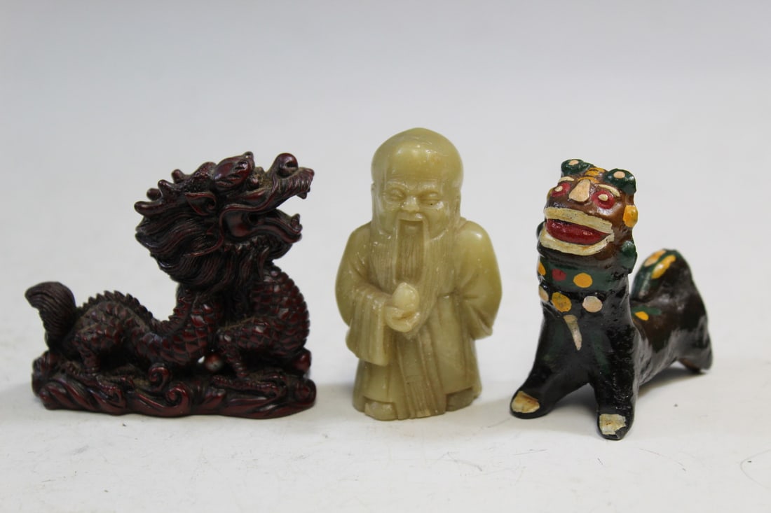 Three Asian Figurines: Three Asian Figurines. Largest L 2.5".
