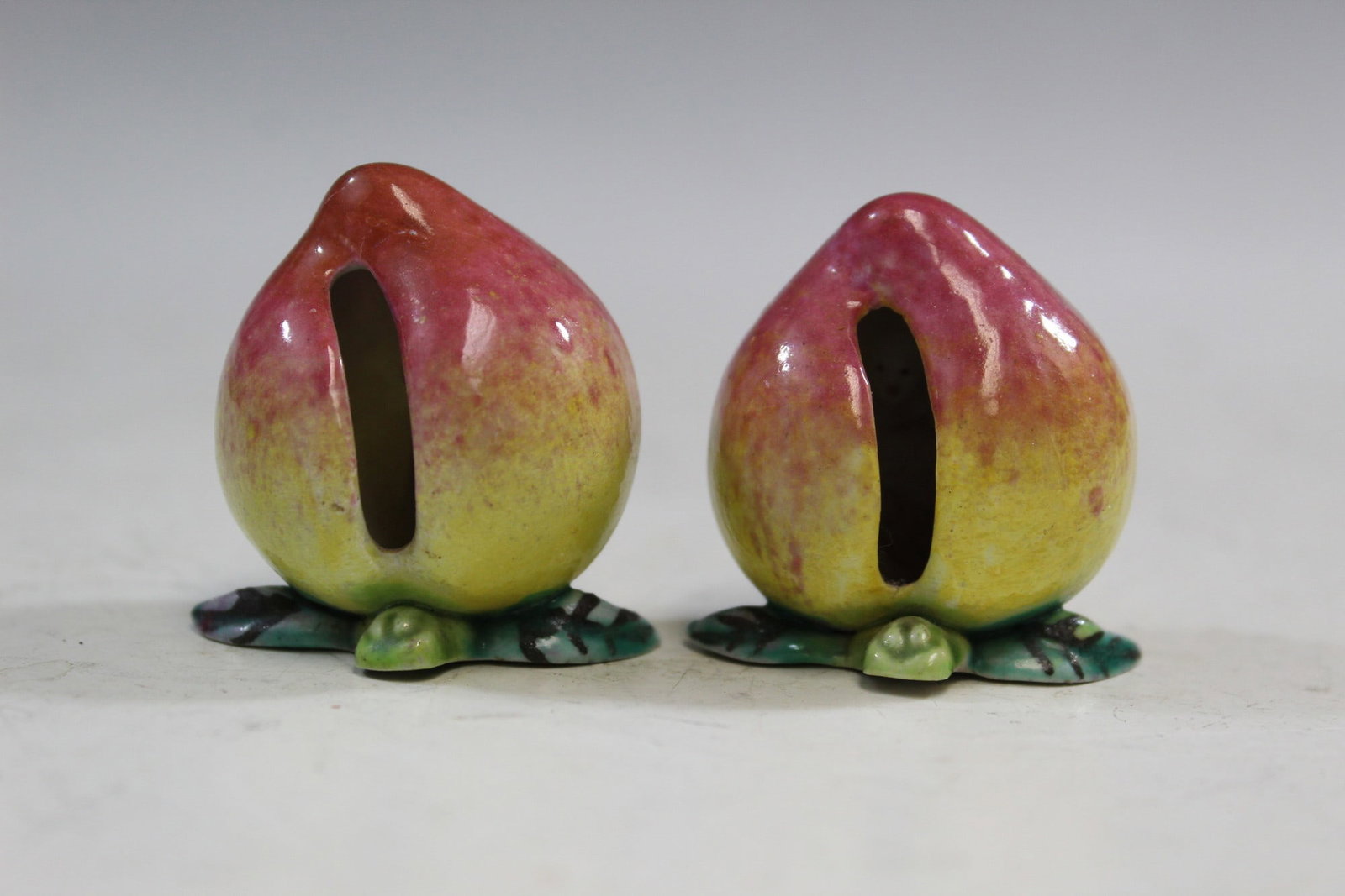 Pair of Chinese Famille Rose Guanyin in A Peach (1 of 6)