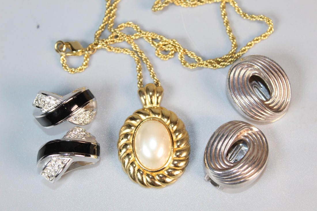 Two Pairs of Christian Dior Earrings and a Christian Dior Necklace: Two Pairs of Christian Dior Earrings and a Christian Dior Necklace. Pendant L 1.25". Necklace L 20".